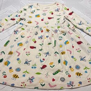 Playful Insect Print Kids Dress in Cream with small flaw shown in photos